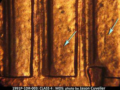Die-stage B marker on 1991P•1DR•003 (1991 Doubled Die Reverse).