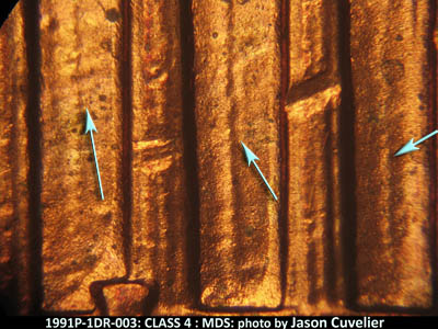Die-stage B marker on 1991P•1DR•003 (1991 Doubled Die Reverse).