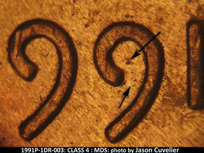 Die-stage B marker on 1991P•1DR•003 (1991 Doubled Die Reverse).