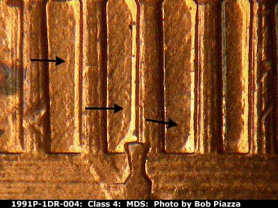 Die-stage B marker on 1991P•1DR•004 (1991 Doubled Die Reverse).