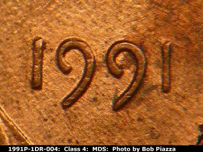 Die-stage B marker on 1991P•1DR•004 (1991 Doubled Die Reverse).