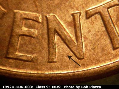 Die-stage B marker on 1992D•1DR•003 (1992 Doubled Die Reverse).