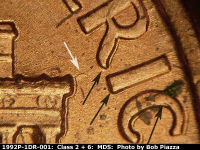 Die-stage B marker on 1992P•1DR•001 (1992 Doubled Die Reverse).