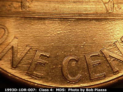 Die-stage B marker on 1993D•1DR•007 (1993 Doubled Die Reverse).