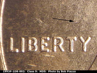 Die-stage B marker on 1993P•1DR•002 (1993 Doubled Die Reverse).