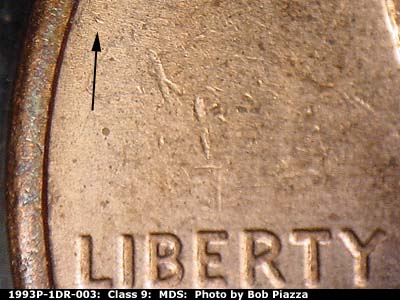 Die-stage B marker on 1993P•1DR•003 (1993 Doubled Die Reverse).