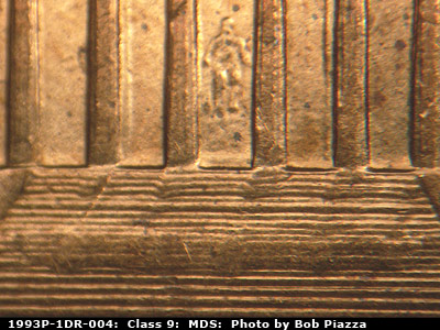 Die-stage B marker on 1993P•1DR•004 (1993 Doubled Die Reverse).