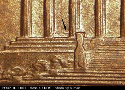 Die-stage B marker on 1994P•1DR•001 (1994 Doubled Die Reverse).