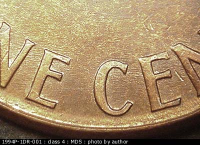 Die-stage B marker on 1994P•1DR•001 (1994 Doubled Die Reverse).