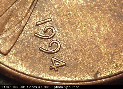 Die-stage B marker on 1994P•1DR•001 (1994 Doubled Die Reverse).