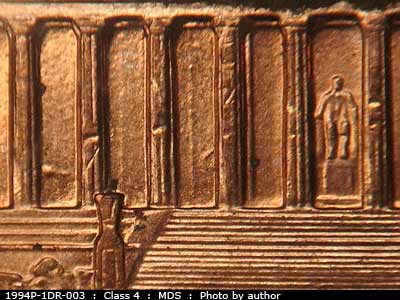 Die-stage B marker on 1994P•1DR•003 (1994 Doubled Die Reverse).
