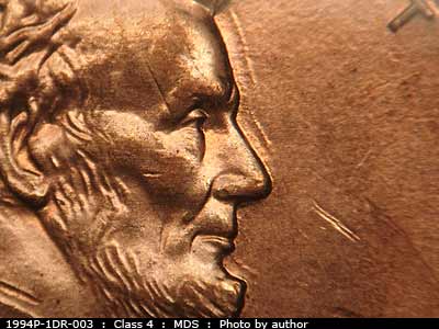 Die-stage B marker on 1994P•1DR•003 (1994 Doubled Die Reverse).