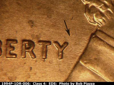 Die-stage A marker on 1994P•1DR•006 (1994 Doubled Die Reverse).