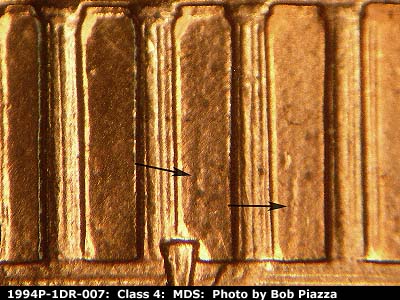 Die-stage B marker on 1994P•1DR•007 (1994 Doubled Die Reverse).