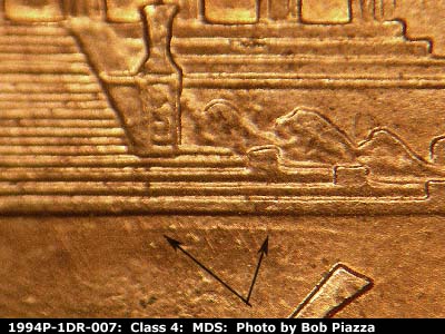 Die-stage B marker on 1994P•1DR•007 (1994 Doubled Die Reverse).