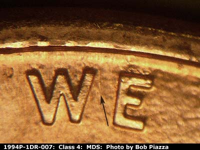 Die-stage B marker on 1994P•1DR•007 (1994 Doubled Die Reverse).
