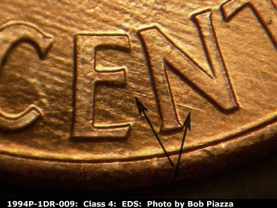 Die-stage A marker on 1994P•1DR•009 (1994 Doubled Die Reverse).
