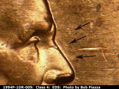 Die-stage A marker on 1994P•1DR•009 (1994 Doubled Die Reverse).