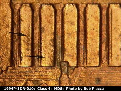 Die-stage B marker on 1994P•1DR•010 (1994 Doubled Die Reverse).