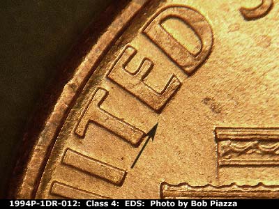 Die-stage A marker on 1994P•1DR•012 (1994 Doubled Die Reverse).
