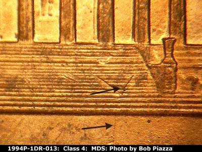 Die-stage B marker on 1994P•1DR•013 (1994 Doubled Die Reverse).
