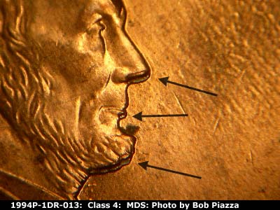 Die-stage B marker on 1994P•1DR•013 (1994 Doubled Die Reverse).