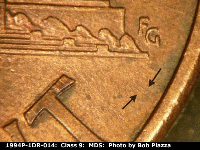 Die-stage B marker on 1994P•1DR•014 (1994 Doubled Die Reverse).