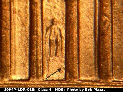Die-stage B marker on 1994P•1DR•015 (1994 Doubled Die Reverse).