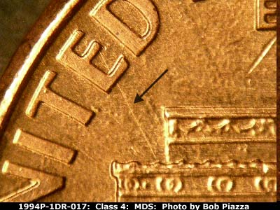 Die-stage B marker on 1994P•1DR•017 (1994 Doubled Die Reverse).
