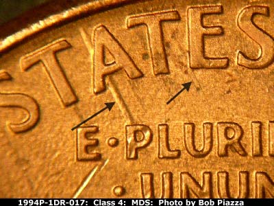 Die-stage B marker on 1994P•1DR•017 (1994 Doubled Die Reverse).