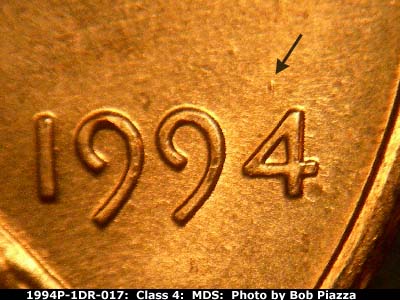 Die-stage B marker on 1994P•1DR•017 (1994 Doubled Die Reverse).