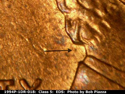 Die-stage A marker on 1994P•1DR•018 (1994 Doubled Die Reverse).