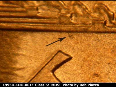 Die-stage B marker on 1995D•1DO•001 (1995 Doubled Die Obverse).