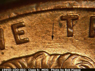 Die-stage B marker on 1995D•1DO•002 (1995 Doubled Die Obverse).