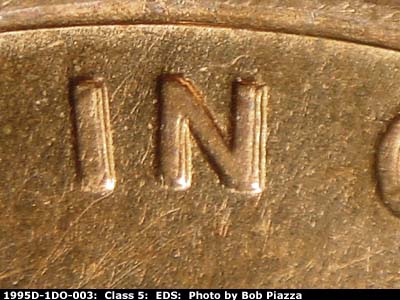 Die-stage A marker on 1995D•1DO•003 (1995 Doubled Die Obverse).