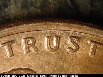 Die-stage A marker on 1995D•1DO•003 (1995 Doubled Die Obverse).