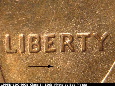 Die-stage A marker on 1995D•1DO•003 (1995 Doubled Die Obverse).
