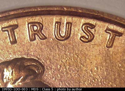 Die-stage B marker on 1995D•1DO•003 (1995 Doubled Die Obverse).