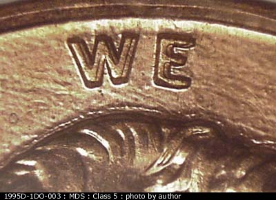 Die-stage B marker on 1995D•1DO•003 (1995 Doubled Die Obverse).