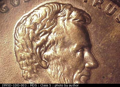 Die-stage B marker on 1995D•1DO•003 (1995 Doubled Die Obverse).