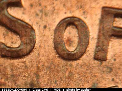 Die-stage B marker on 1995D•1DO•004 (1995 Doubled Die Obverse).