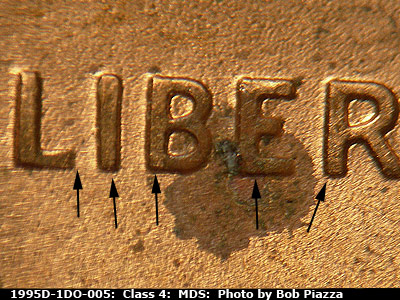 Die-stage B marker on 1995D•1DO•005 (1995 Doubled Die Obverse).