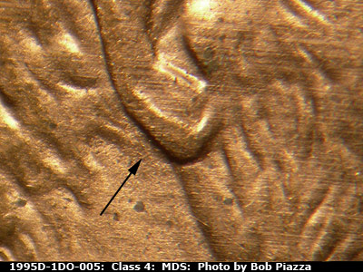 Die-stage B marker on 1995D•1DO•005 (1995 Doubled Die Obverse).