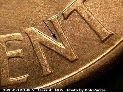 Die-stage B marker on 1995D•1DO•005 (1995 Doubled Die Obverse).