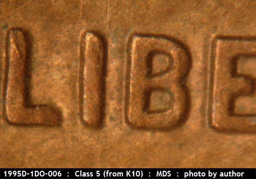 Die-stage B marker on 1995D•1DO•006 (1995 Doubled Die Obverse).