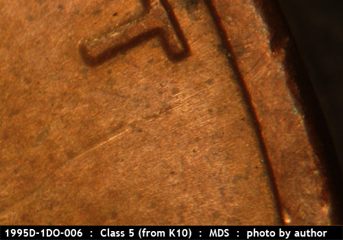 Die-stage B marker on 1995D•1DO•006 (1995 Doubled Die Obverse).