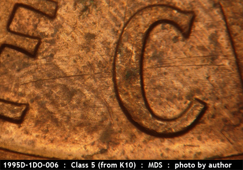 Die-stage B marker on 1995D•1DO•006 (1995 Doubled Die Obverse).