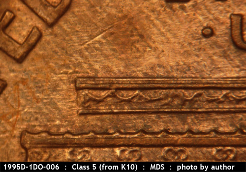 Die-stage B marker on 1995D•1DO•006 (1995 Doubled Die Obverse).