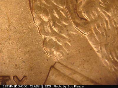 Die-stage A marker on 1995P•1DO•001 (1995 Doubled Die Obverse).