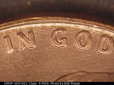 Die-stage B marker on 1995P•1DO•001 (1995 Doubled Die Obverse).